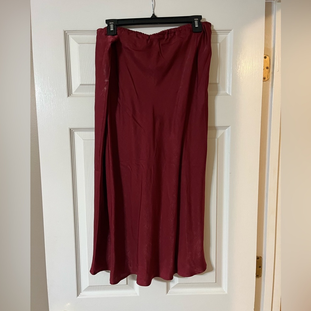 Size XL burgundy skirt from Wal Mart.  Never worn.  Thin material.